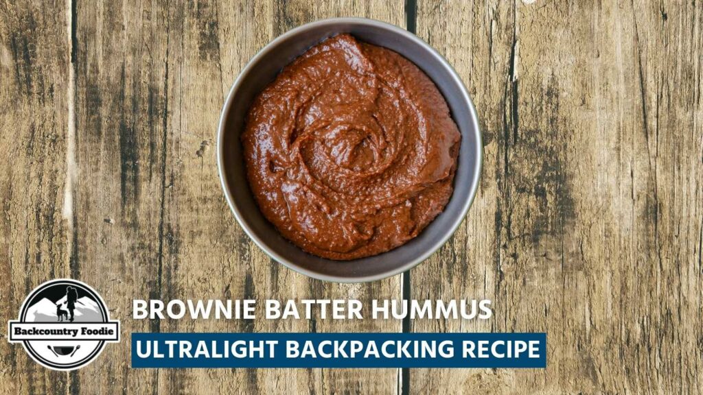 This chocolate hummus recipe is absolutely divine and a healthy snack, too! Use this recipe to fuel your backpacking adventures or an afternoon treat at home. We recommend making two batches and saving a batch for later will be tough. Just sayin'! Check out backcountryfoodie.com for more recipes and backpacking meal planning tips. #backcountryfoodie #ultralightbackpacking #backpackingfood #backpackingmeals #backpackingrecipes