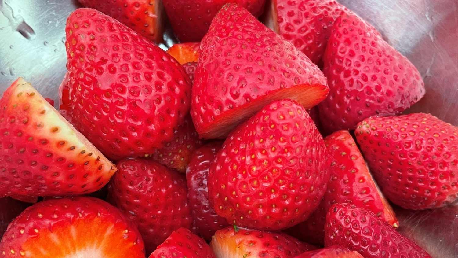 whole fresh strawberries to be dehydrated and freeze-dried for backpacking meals
