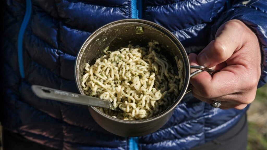 Are you new to making DIY backpacking meals or do you find preparing meals too time-consuming? Backcountry Foodie's ultralight Garlic Parmesan Ramen backpacking recipe takes less than 5 minutes to prepare and is hands down cheaper and tastier than most freeze-dried meals. It’s the perfect recipe to get you started and one of our go-to favorites. #backpackingmeal #hikingfoodideas #backpackingfoodideas #backpackingfood #hikingfood #hikingrecipes #backcountryfoodie