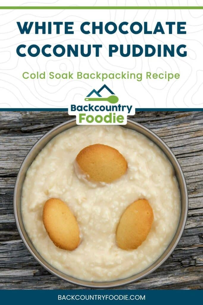 White chocolate coconut pudding with three vanilla wafers sticking out of it
