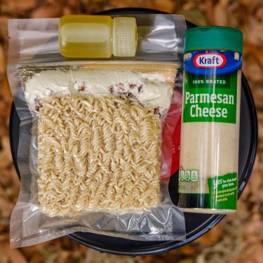 backpacking food packaged with olive oil and parmesan cheese