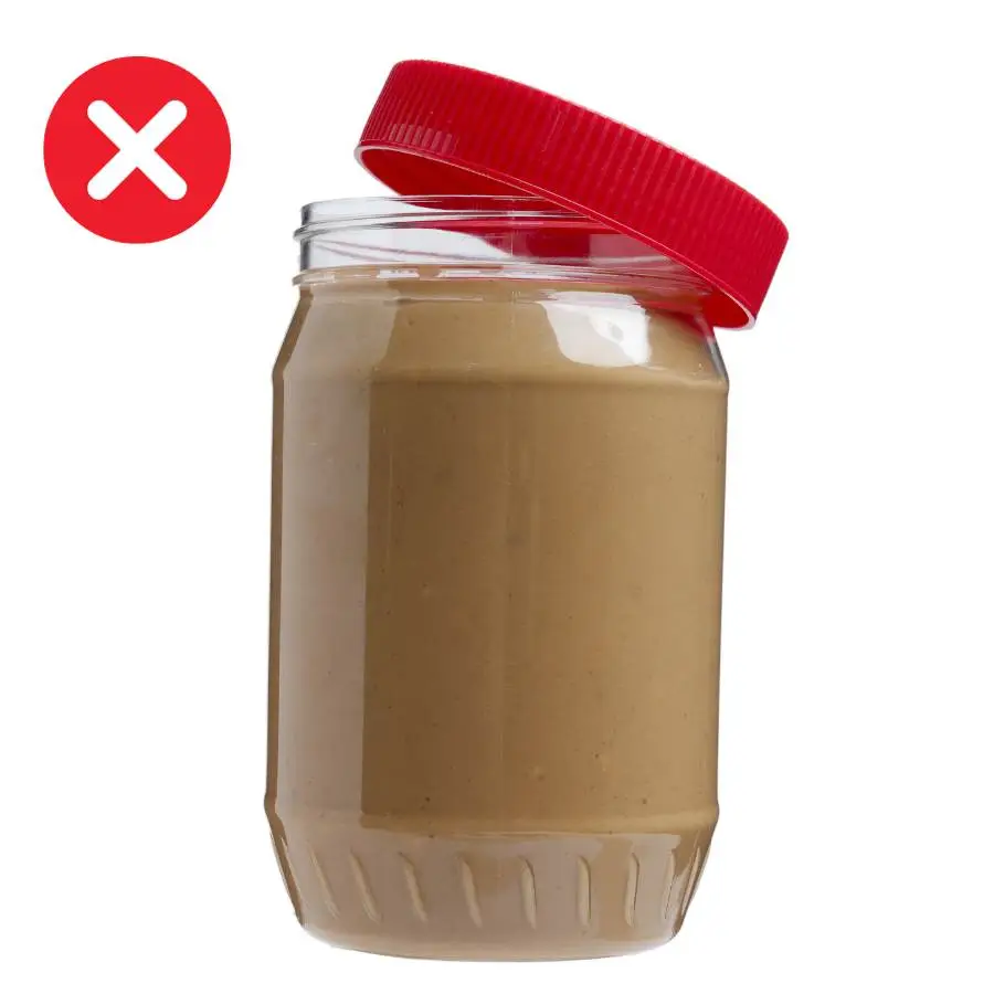 Plastic peanut butter jar with red lid and red X, shown as not recommended for cold soaking due to narrow opening and difficult cleaning.